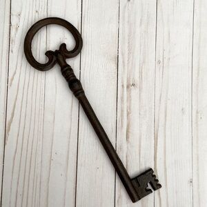 Old, metal rustic key 13” long. Beautiful home decor for a farm house and more!